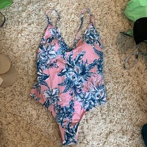 Pink and blue flowered one piece swim suit